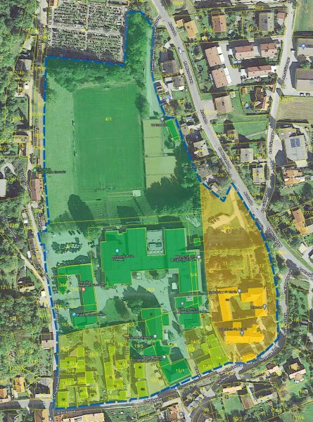 Bird's eye view of the Gratwein educational campus, divided into areas marked in green, yellow and orange.