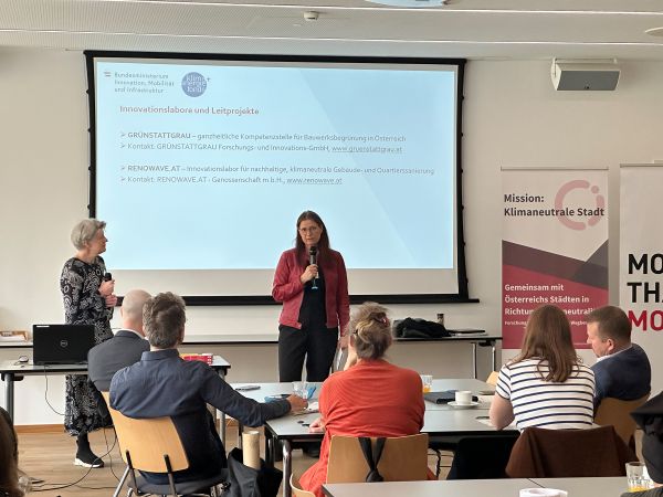 Vortragende und Publikum