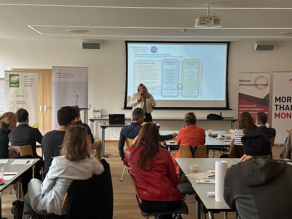 Vortragende und Publikum