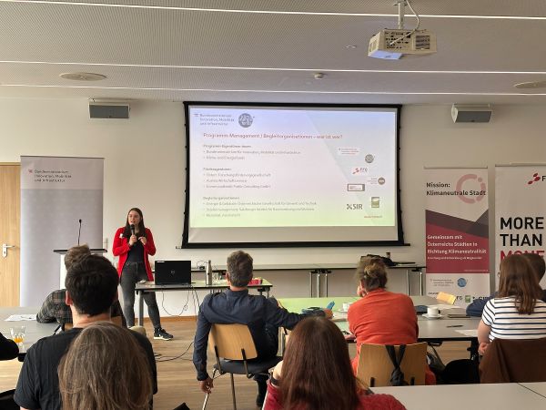 Vortragende und Publikum